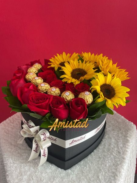Ref 15 - Arreglo con rosas, girasoles y chocolates.