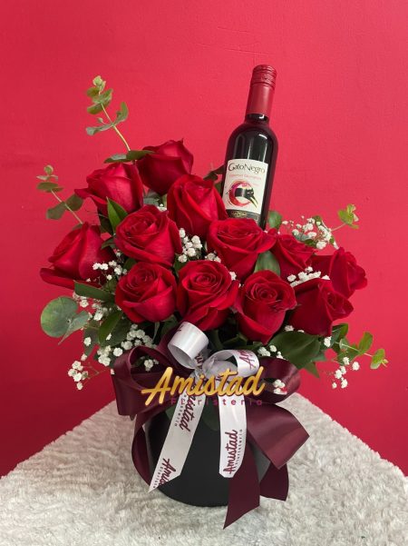 AA 7 - Arreglo floral con rosas y vino