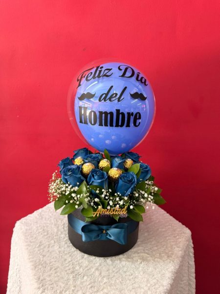 H6 - Caja decorativa con rosas azules, chocolates y globo personalizado.
