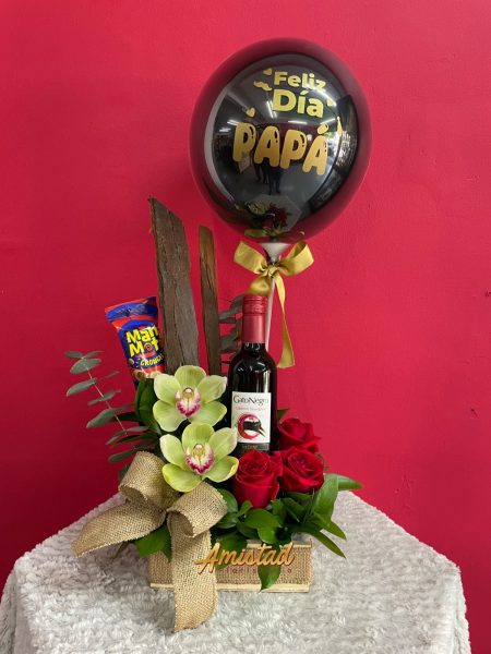 H19 - Arreglo con rosas, cymbidium, maní, globo personalizado y vino.